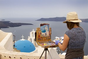Painting in Santorini • Photo by Celia Carson